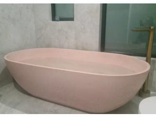 Disty pink concrete bath